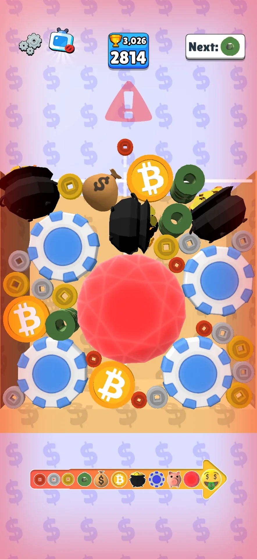 Money Merge 3D gameplay with Bitcoin coins, poker chips, and a red gem in the merge box